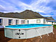 Piscine hors-sol acier Toi MAGNUM ovale 730x366x132cm filtre a sable 8m3/h - Autre vue