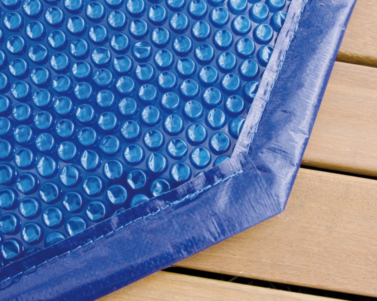 Bache a bulles Ubbink bordee pour piscine 300x400cm epaisseur 400 microns bleu