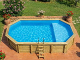 Piscine bois Altanka NEMO octogonale allongee avec plage 7,3 x 3,97m H 1,45m liner bleu, ancrage beton - Autre vue