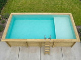 Piscine bois Altanka AQUA rectangulaire avec plage 7,0 x 3,75m H 1,45m liner sable, pose sur dalle